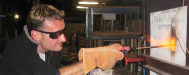 Pierre Bounaud firing a soda kiln.
